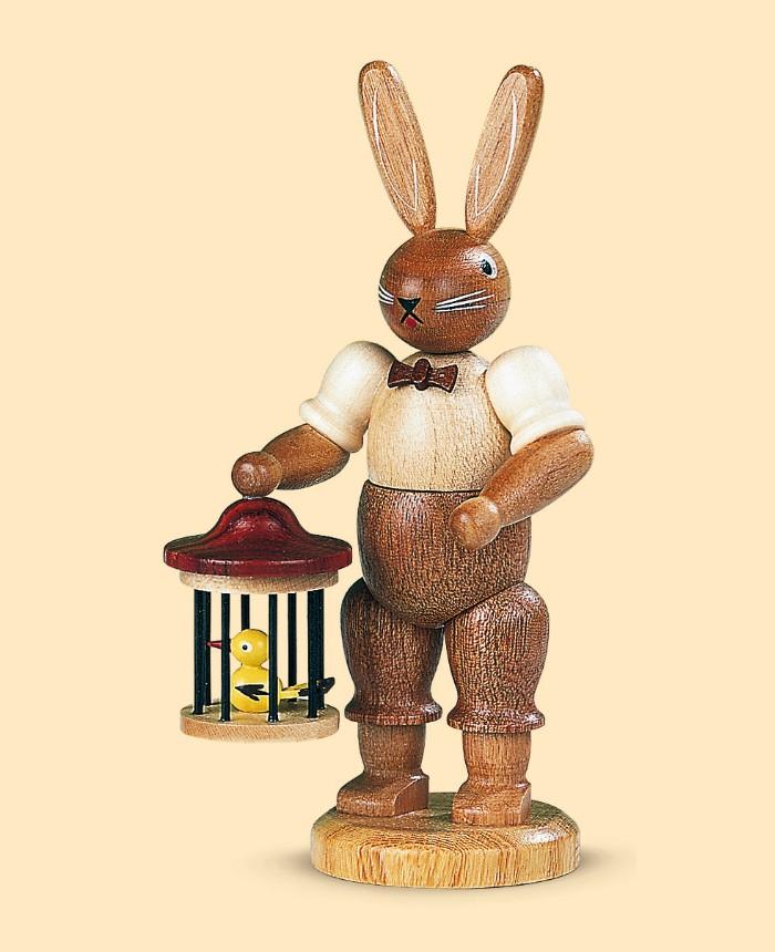 Foto Conejo de Pascua señor conejo con jaula de pájaro, 11 cm. de alto, natural, original de los Montes Metálicos (Erzgebirge) hecho por la empresa Müller del pueblo de Seiffen