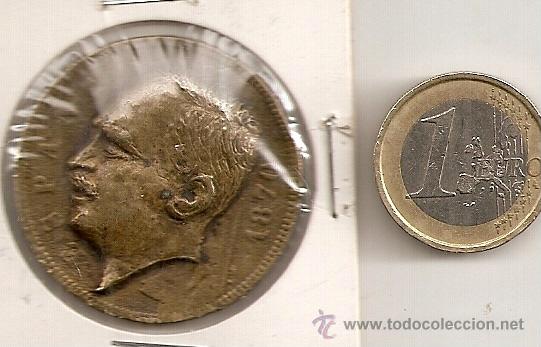 Foto medalla antigua sin determinar tamaño duro bronce sobre modelo