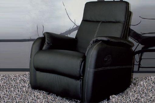 Foto Sillón relax reclinable con palanca, en piel textil color negro con hilo contrastado.