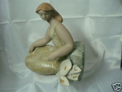 Foto Dama Con Calas I. Figura En Porcelana De Gres De  Lladró. Figure Porcelain Grees foto 833137